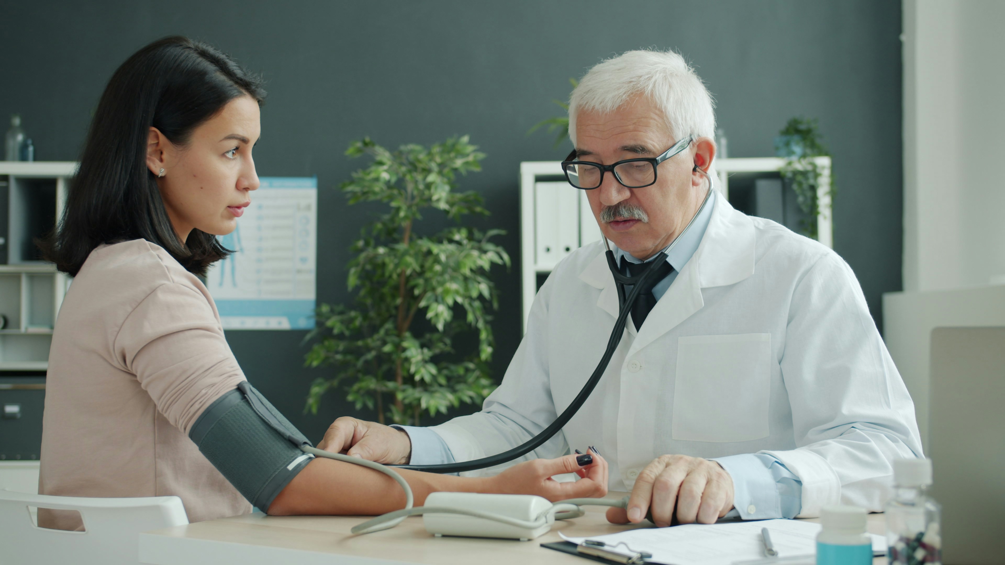 A doctor examining a patient