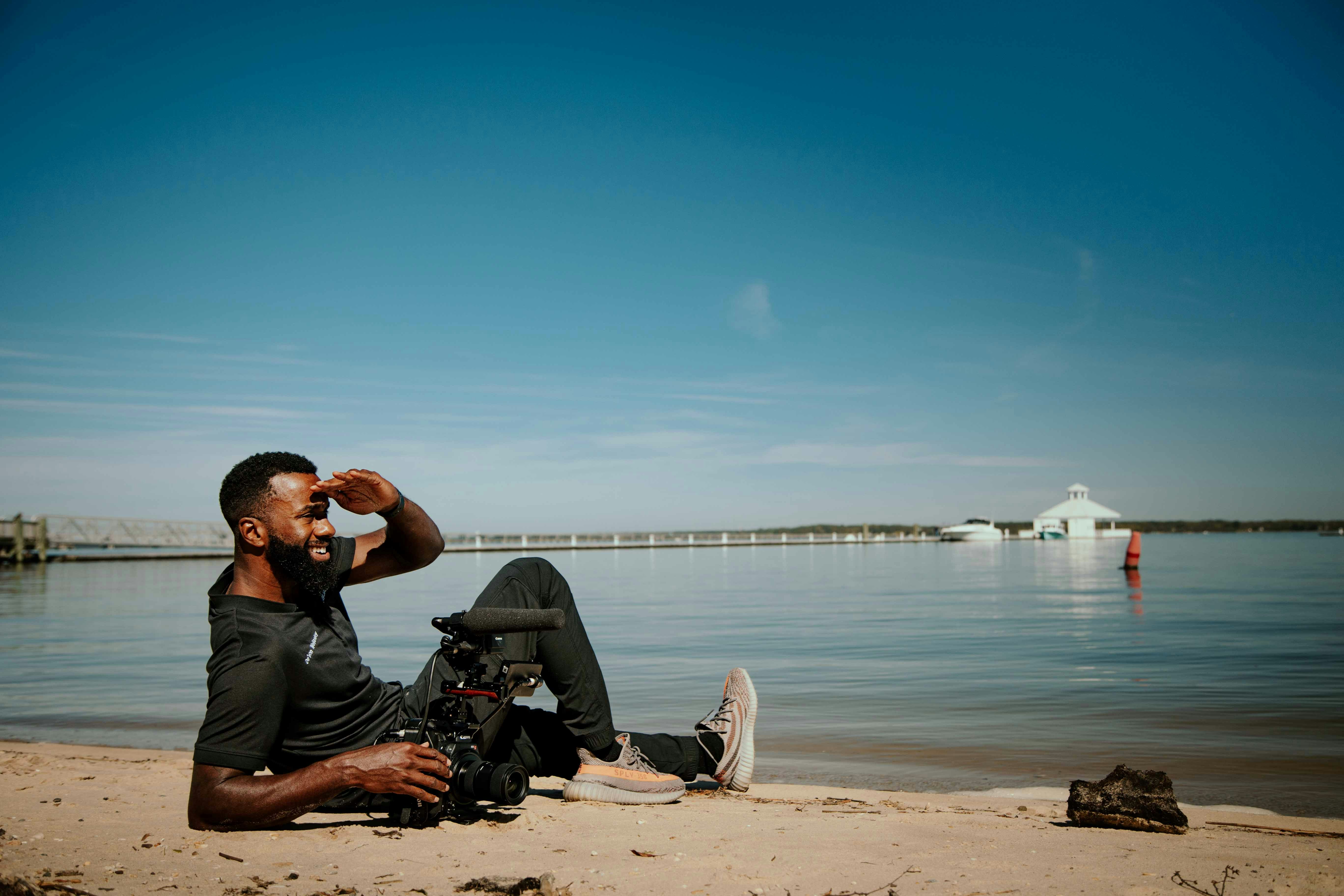 Man looking out over the Chesapeake Bay waterfront